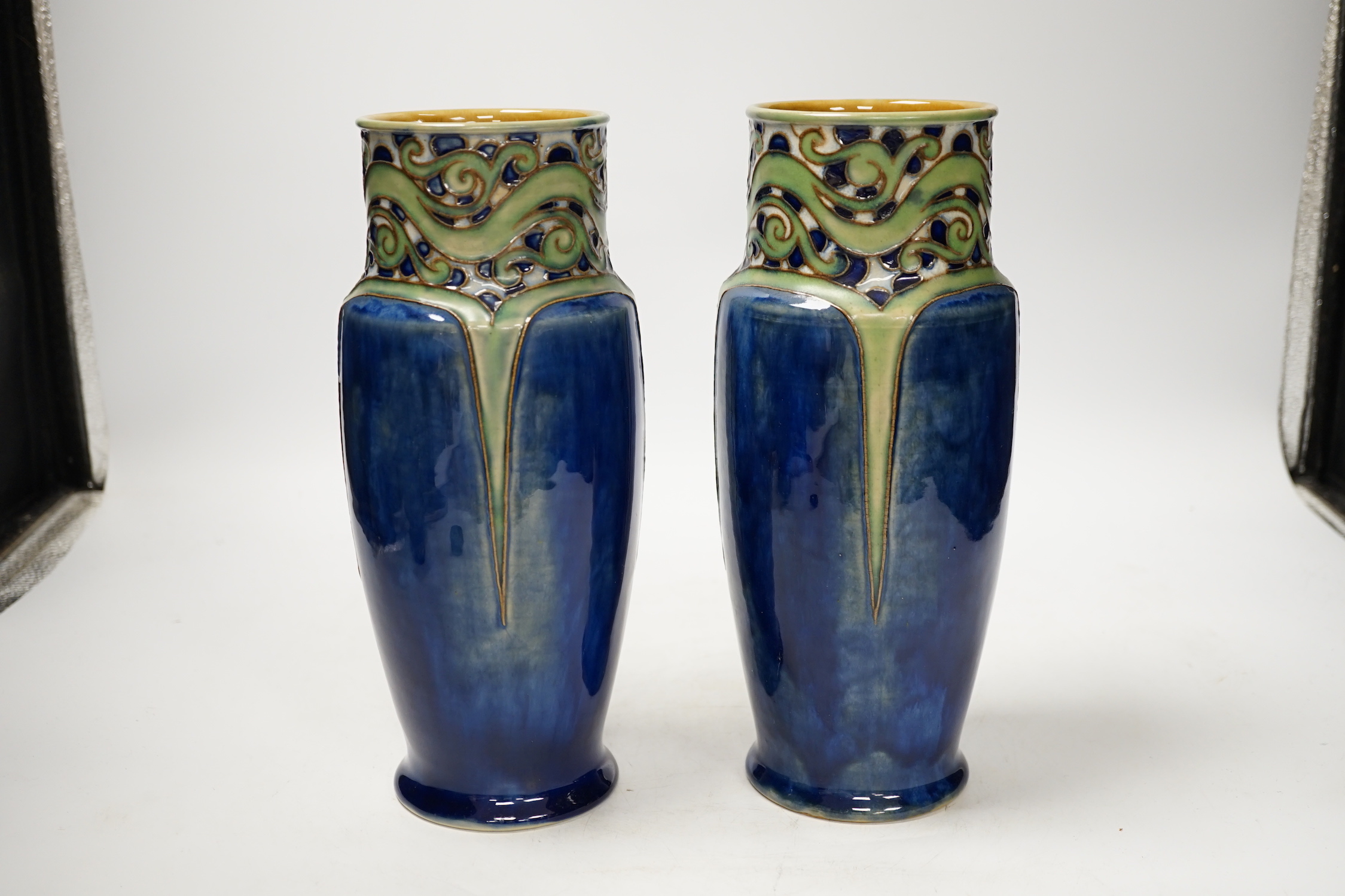 A pair of Royal Doulton Frances E. Pope vases, 25cm